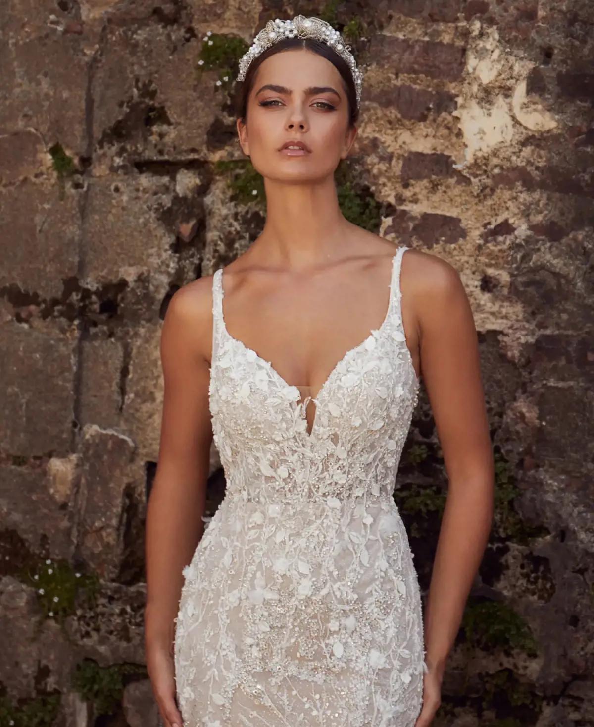 Model wearing white Demetrios wedding dress. Desktop